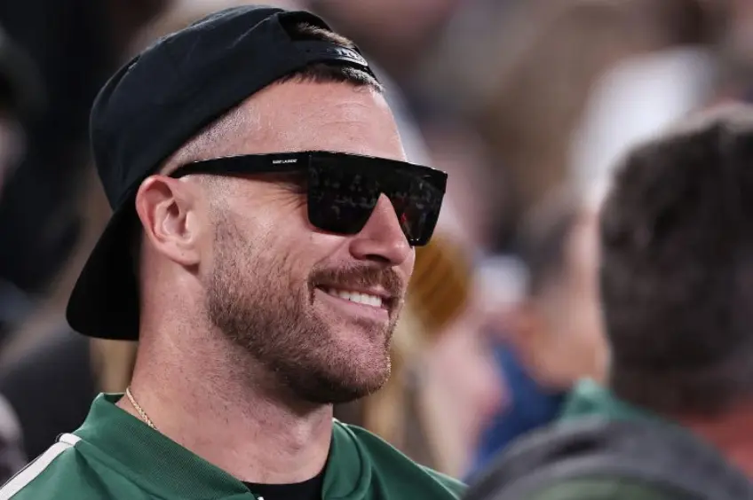 How did Travis Kelce gain the Spotlight after a Gift from Swiftie?